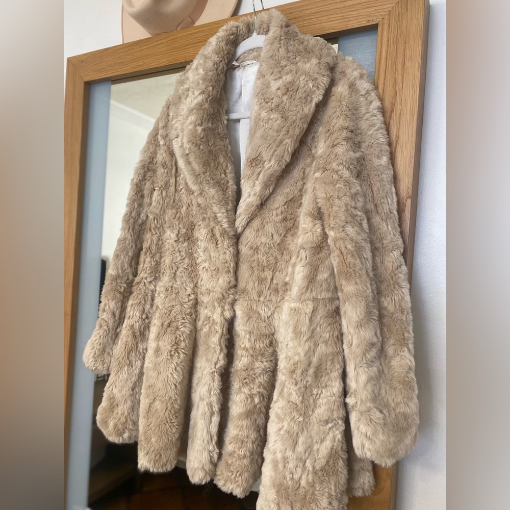 Free people faux fur coat in good condition